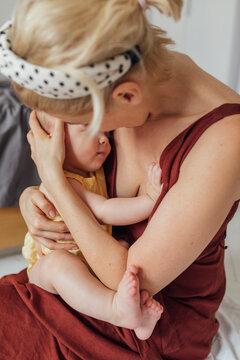 Motherhood: Doting Mother Having Some Cuddle Time With Her Kid