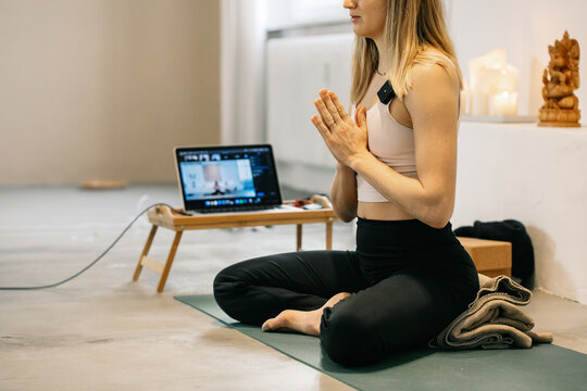 Anonymous Yoga Instructor Teaching Online Mindfulness Meditation