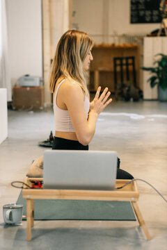 Caucasian Yoga Instructor Teaching Online Mindfulness Meditation