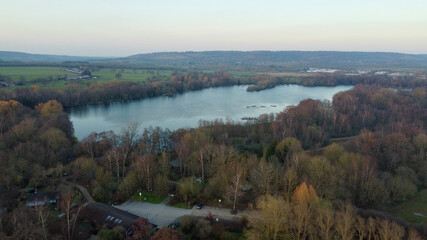 Aerial view of countryside and lake.