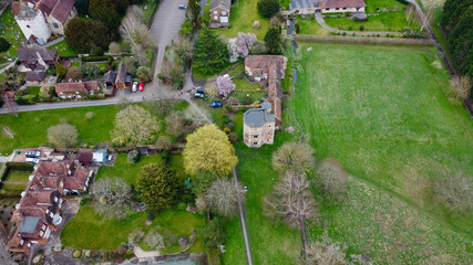 Overhead view of English village and castle.