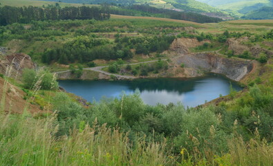 Fototapeta na wymiar Emerald Lake from Racos, Brasov, Transylvania, Romania