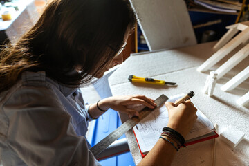 young architect working on drafts