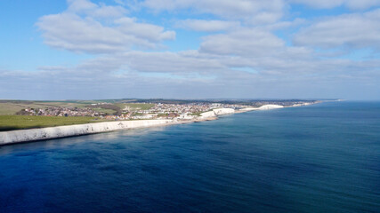 Aerial view of white cliffs and coastline.