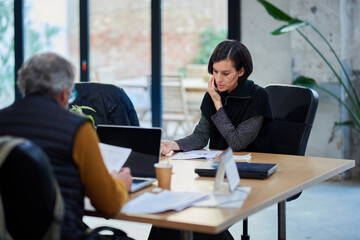 Manager talking on phone