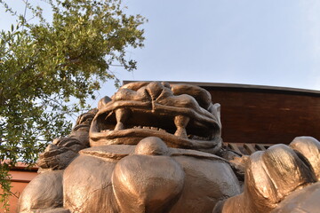 Fototapeta na wymiar Estatua china, león, estatua, escultura, japonesa