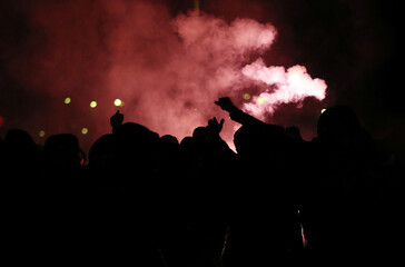 Fototapeta na wymiar Football fans with torches