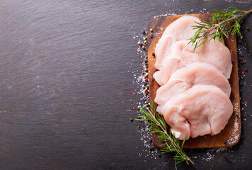 fresh turkey meat with rosemary and spices, top view