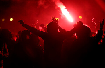 Football fans with torches