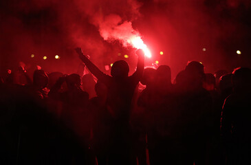 Football fans with torches