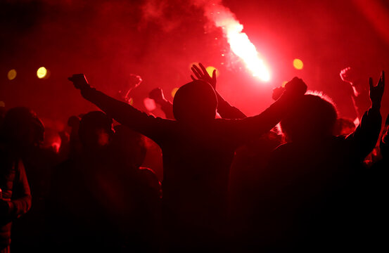 Football fans with torches