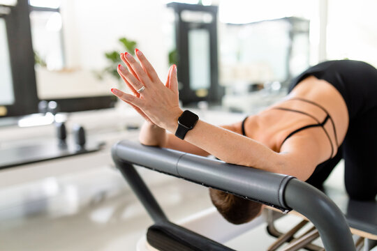 Fit Woman Does Prayer Hands While Stretching 