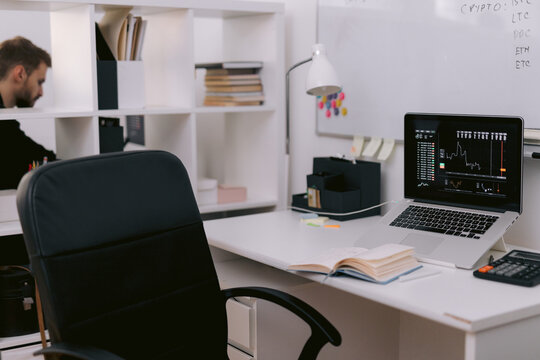 Modern workplace of trader in office