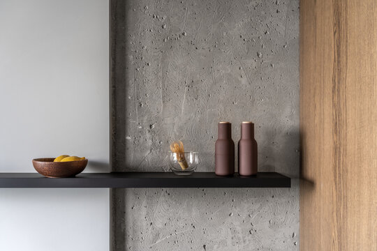 Closeup view at dark shelf with dishes