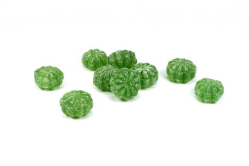 Green mint candies isolated on white background.
