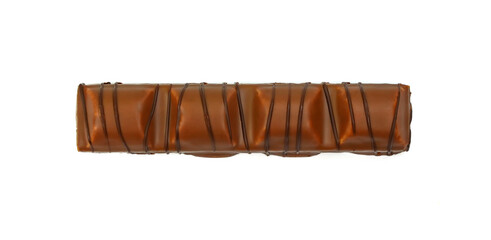 Black chocolate bar with soft hazelnut filling isolated on white background.
