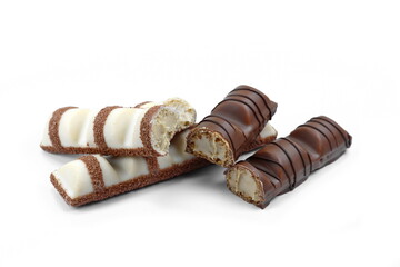 White Chocolate Bar and black chocolate bar with soft hazelnut filling isolated on white background.