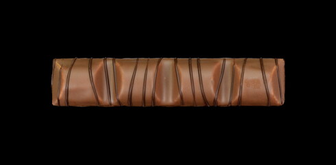 Chocolate Bar with soft hazelnut filling isolated on black background.