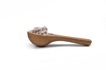 A heap of Whey chocolate protein powder  in a wooden spoon isolated on white background.