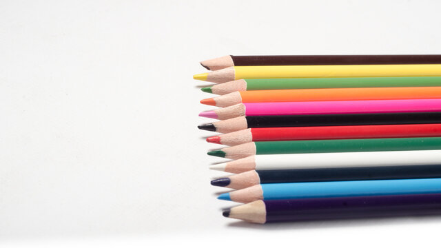 Rainbow pencils - coloured pencils on a white background. education  concept. Stock Photo | Adobe Stock