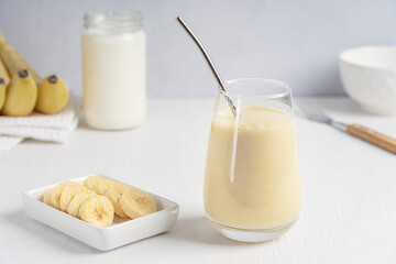 Refreshing lassi traditional indian drink made of yogurt or milk blended with banana fruit served...