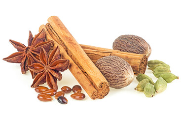 Traditional Christmas spices - cinnamon sticks, star anise, nutmeg and cardamom pods isolated on a white background. - obrazy, fototapety, plakaty