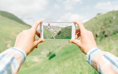 Navigating geolocation points in mountainous terrain via cell phone.