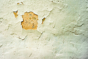 Texture of a concrete wall with cracks and scratches which can be used as a background