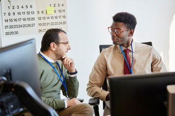 Co-worker businessmen talking 