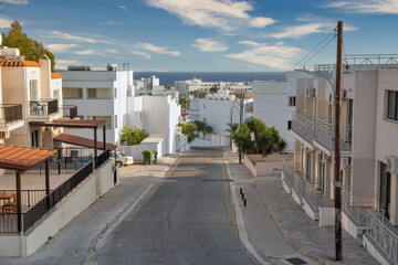 Fototapeta na wymiar Cityscape with small street in Ayia Napa, Cyprus.