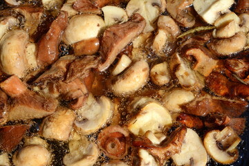 Frying mushrooms in oil. Delicious fried mushrooms in pan.