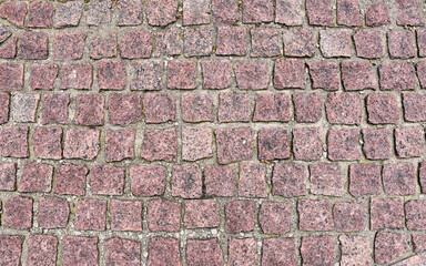 Old cobblestone pavement close-up. Pavement texture.