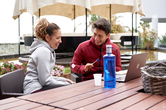 Man and woman laughing