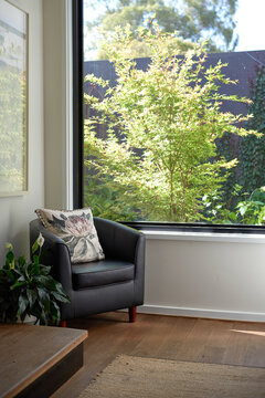 Bright corner of home with reading chair