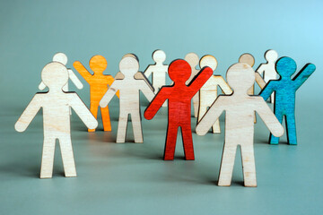 Uniqueness and difference for talent management. Unique figurines in the crowd.
