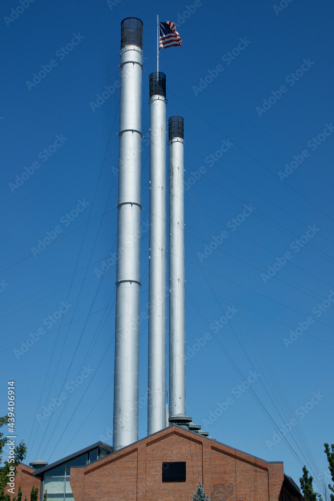 Poster three smoke stacks on the old saw mill