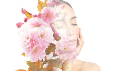 Creative portrait of young Asian woman with beautiful flowers on white background
