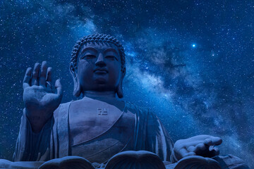 The big Tian Tan Buddha at Po Lin Monastery in Hong Kong during night time. Beautiful night sky...