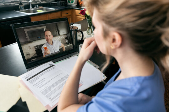 Home: Nurse Has Telehealth Meeting With Patient