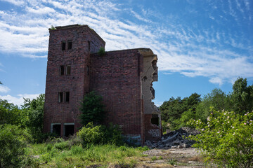 Fototapeta na wymiar Ruins of old military East Prussian air hangars from the Second World War on the Vistula Spit, now destroyed