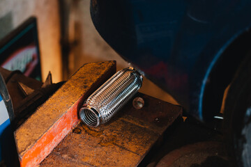 New car silencer corrugation.