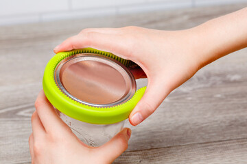 Rubber hand opening jar lid 