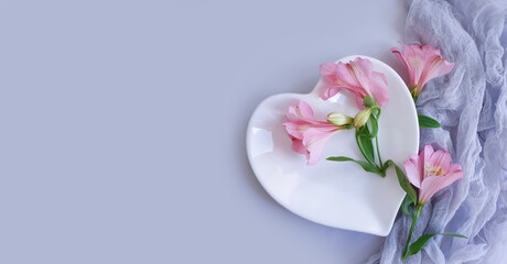 plate heart, flower on a colored background