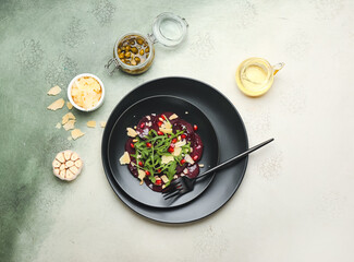 Composition with delicious beetroot carpaccio on color background