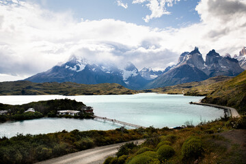 Naklejka na ściany i meble Torres del Paine National Park, Patagonia, Chile Beautiful mountain landscape with a beautiful lake with a jetty as a backdrop. Chile.