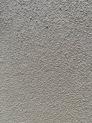 grey textural cement wall as a background