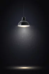Fotobehang Lamp in dark room. Spotlight on black background. Place for text or product presentation. © Yuri Hoyda