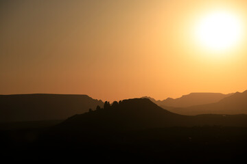 Colorful sunset over a desert mountain landscape