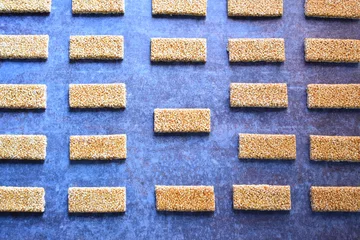 Raamstickers Sesame Chikki Indian traditional brittle sweet made from sesame seeds and jaggery © Maneesh