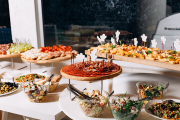 festive buffet slicing cheese sausage snack bread